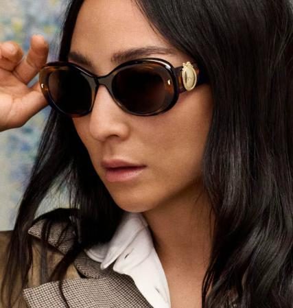 Dior sunglasses with a medallion at the temple front